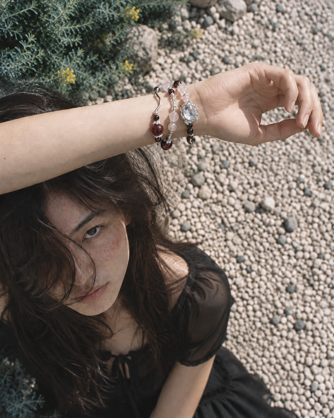 Garnet Mix Charm Bracelet worn on wrist